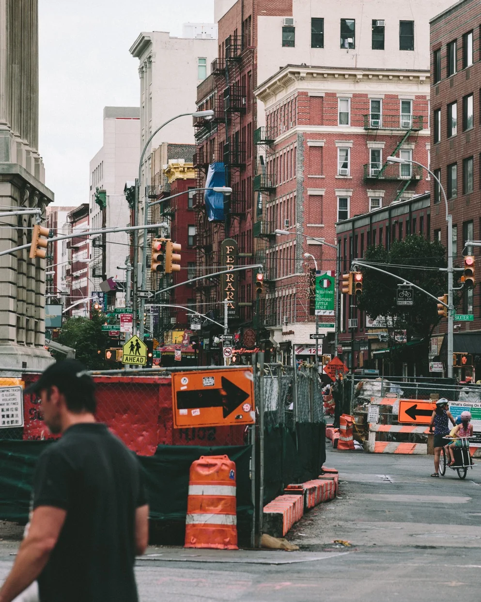 Street construction and pedestrians on a New York corner