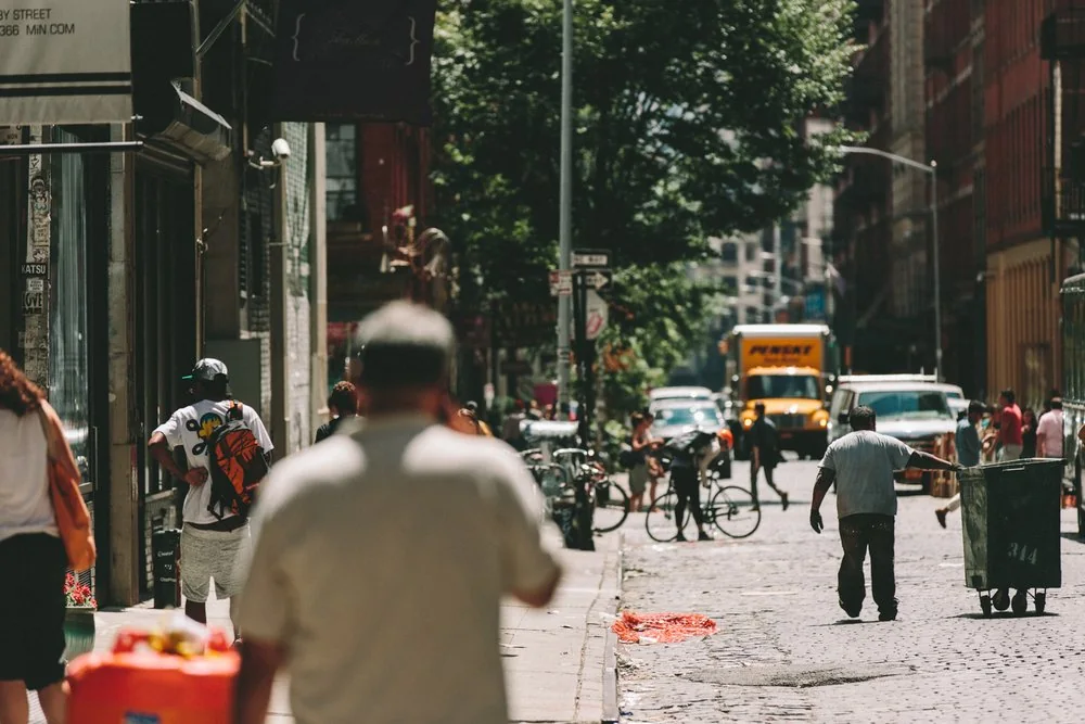 Pedestrians and street vendors on a New York street